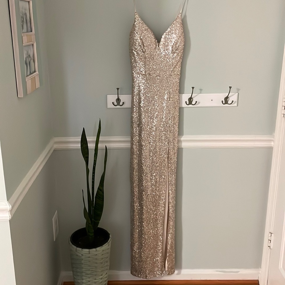 Shiny champagne/tan dress. Size small. Slit on left leg. Perfect for NYE event.